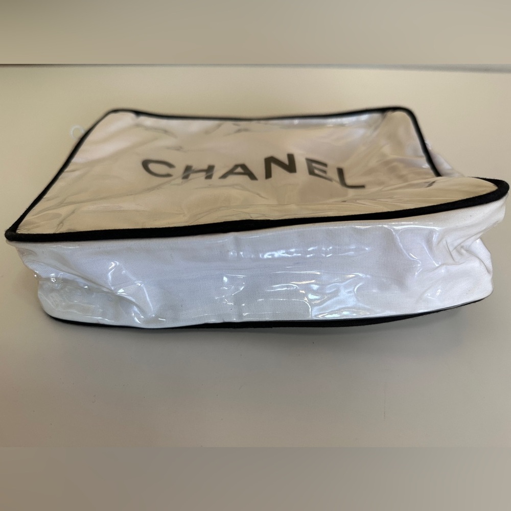 Chanel Beauty Cosmetic Case, in white, lined with black canvas &plastic cover.